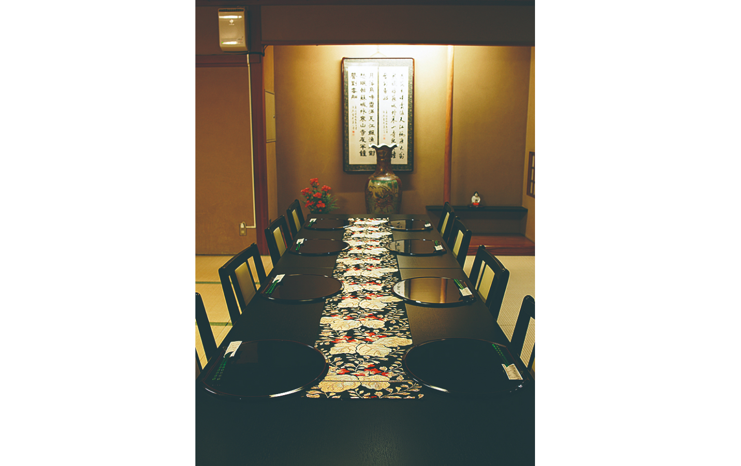 The private tatami-mat room offers chair-seating in a traditional Japanese setting.